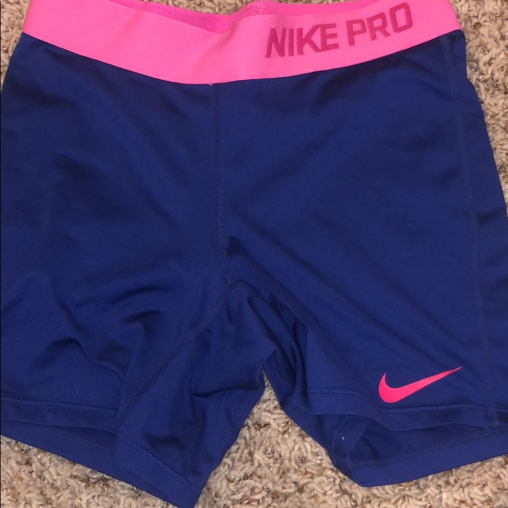 Navy nike pros with pink band